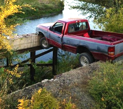 ignoring the bridge out sign